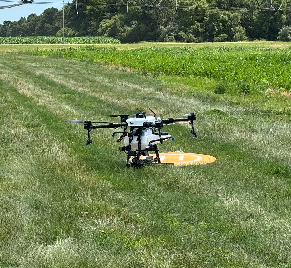 Agricultural drone conducting field monitoring and data collection